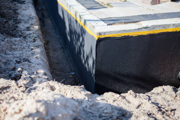 Professional Waterproofing technician working in Allgood, AL
